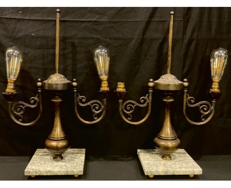 A pair of bronzed metal two light side lights, scroll arms, marble bases, 59cm high 