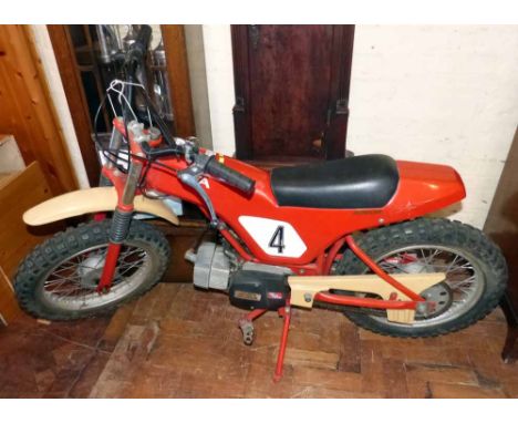 BSA junior motorbike with 2 stroke engine and single speed automatic clutch, bought in Harrods in 1986. Condition report: see