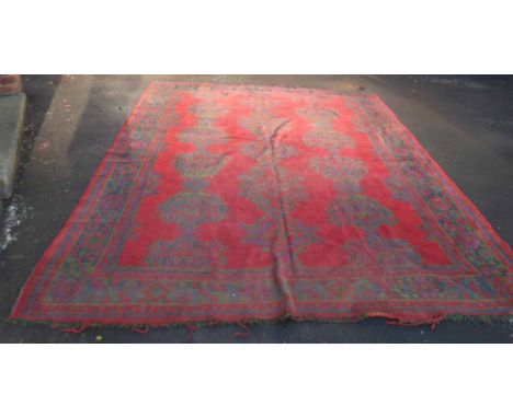 Turkey red and blue lounge carpet 326cm x 265cm. Condition report: see terms and conditions.