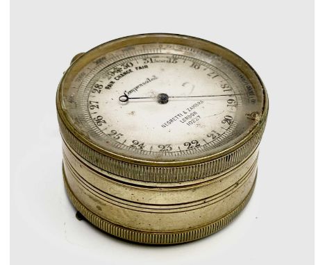 A Negretti &amp; Zambra pocket barometer combined compass, compensated movement, No 10227, with gilt metal case, diameter 4.8