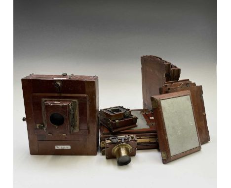 A late Victorian mahogany and brass plate camera, 'The International', by J Lancaster &amp; Son, Birmingham, together with an