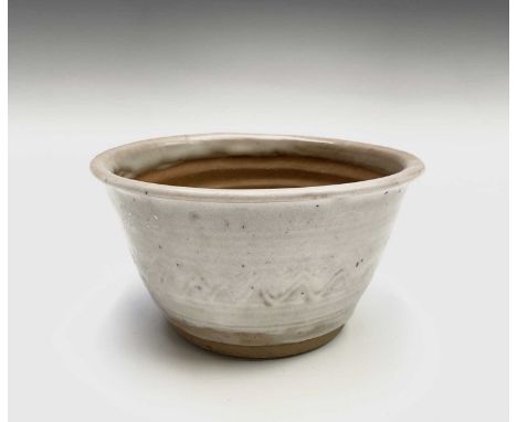 Katharine PLEYDELL-BOUVERIE (1895-1985) A studio pottery bowl, with horizontal incised decoration and celadon ground, height 