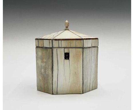 A George III ivory veneered octagonal tea caddy, with tortoiseshell lining and lidded compartment, width 12cm.Provenance:Mich