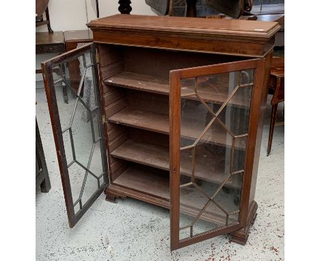 A 19th century mahogany bookcase, with a pair of astragal glazed doors enclosing shelves, on bracket feet, height 123cm, widt