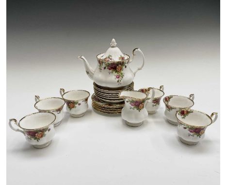 A Royal Albert 'Old Country Roses' tea set comprising teapot, milk jug, six cups, six saucers, and six side plates.Condition 