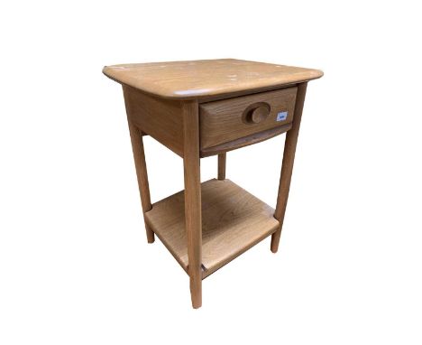 An Ercol light elm small side or bedside table, fitted a single drawer and a lower tier with turned beech supports, height 66