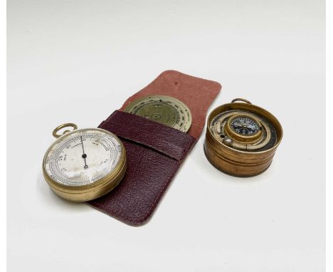 A gilt metal cased pocket barometer and altimeter, with silvered dial, diameter 5cm, a late Victorian combined barometer, com