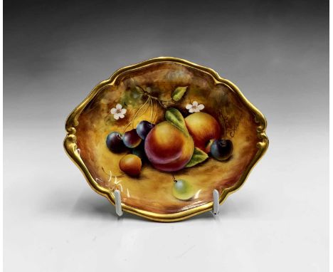 A Royal Worcester fruit painted small dish, signed C. Winwood, late 20th black printed mark, width 12cm.Condition report: No 