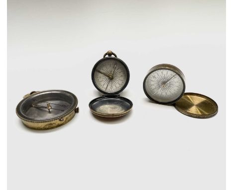 A late Victorian brass pocket compass, retailed by W Gregory &amp; Co, Strand, London, with hinged cover, diameter 4.5cm toge