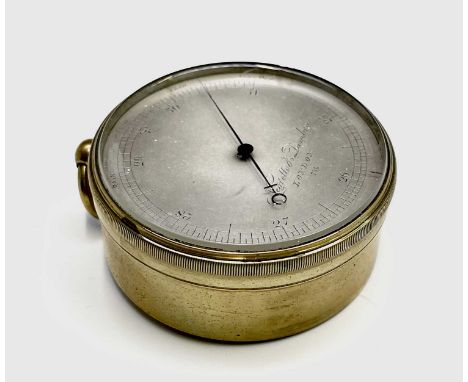 A Negretti &amp; Zambra pocket barometer, circa 1870, the sivered dial numbered 758, diameter 7cm.Condition report: Generally