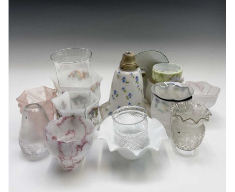 A quantity of assorted early 20th century glass lamp shades, including an enamel example.