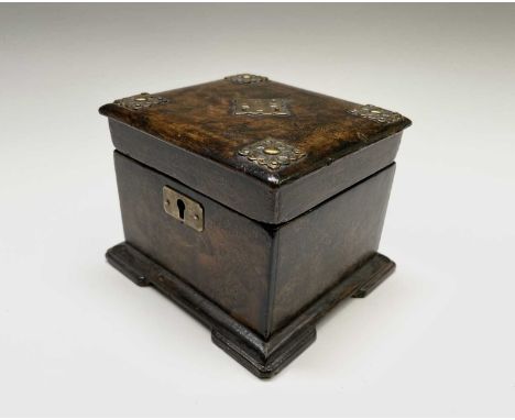 A Victorian papier mache rectangular tea caddy, with a burrwood finish and pierced brass mounts, the interior with a single l