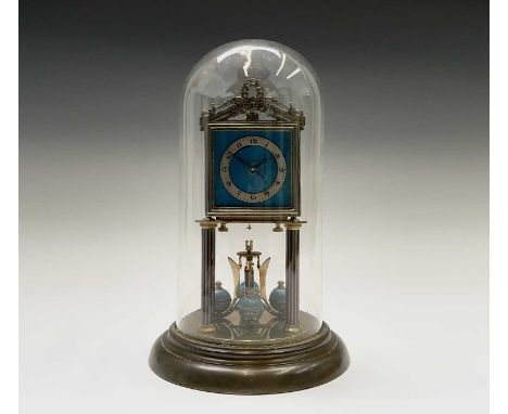 A Jahresuhrenfabrik 400 day torsion clock, 1920s, with blue enamel dial and ball pendulum, the movement with stamped elephant