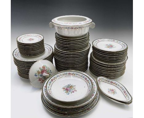 An extensive Limoges dinner service, with floral printed decoration, stamped mark for Baynaud &amp; Co and comprising......