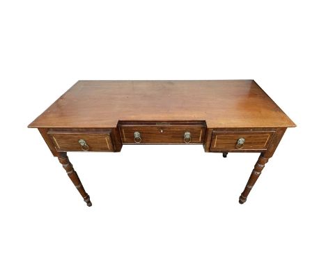 A George IV mahogany inverted breakfront side table, fitted three rosewood banded drawers, on ring turned legs, height 81cm, 