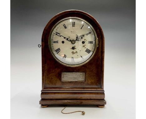 A burr walnut triple train bracket clock, by Maple, London, with dome top and repeat mechanism, striking on a series of coile