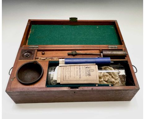 A Townson & Mercer Calorimeter or fuel tester, contained in a fitted mahogany box and with glass cylinder, iron pestle and mo