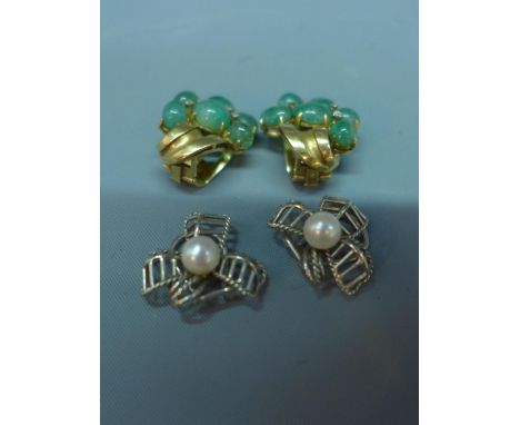 A pair of 18ct yellow gold, jade and diamond inset clip on earrings, stamped 18ct, together with a pair of white metal and pe