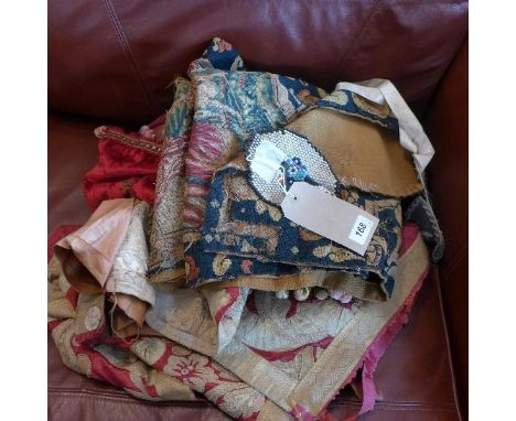 A collection of textiles, to include two textiles embroidered with figures amongst scrolling foliage, two  textiles embroider