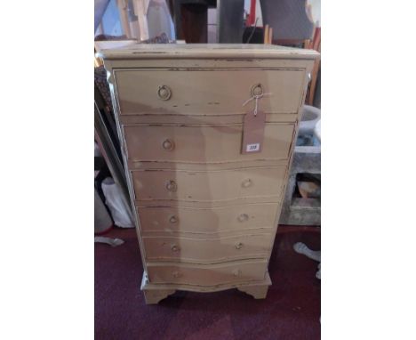 A 20th century painted serpentine front pedestal chest, with six drawers raised on bracket feet, H.100 W.55 D.44cm 