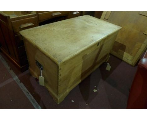 A pine trunk with twin carrying handles 
