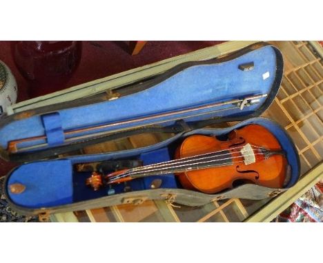 An early 20th century violin, bearing label 'Antonius Stradivarius Cremonensis Faciebat Anno 17, Made in Czechoslovakia', tog