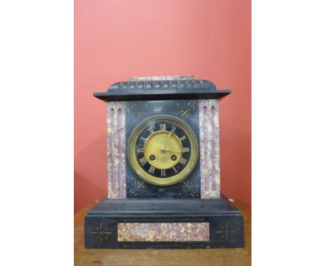 A 19th Century French Belge noir mantel clock