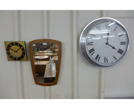 A teak framed mirror, a Junghans wall clock and another clock
