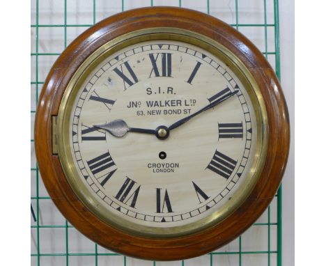 A beech circular fusee wall clock, marked S.I.R. Jno. Walker Ltd., Croydon, London
