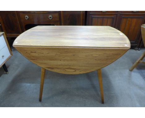 An Ercol drop leaf table