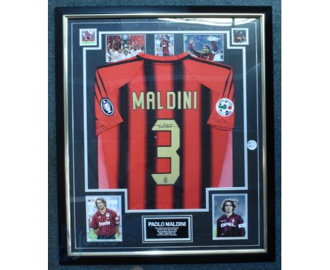 Maldini signed red and black AC Milan No.3 home replica jersey,&nbsp;short-sleeved, with LEGA Calcio Serie A and UEFA Champio