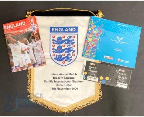 International Match Pennant Brazil v England Kahlifa International Stadium Doha Qatar 14th November 2009 together with Progra