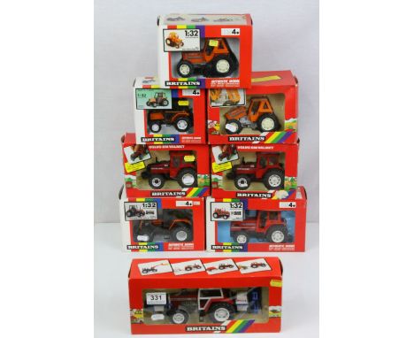 Eight boxed 1:32 Britains model tractors to include 9498 Renault TZ16 Double Rear Wheeled Tractor (modified by SD Frater), 95
