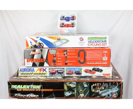 Four boxed slot car starter sets to include Scalextric C664 Le Man 24 Hour, Scalextric Velodrome Cycling Set, Nimco Speedway 