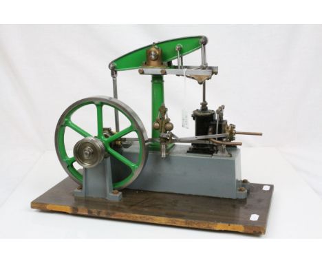 Stuart live steam single cylinder beam engine in green and grey livery on wooden base, base measures 41 x 21cm