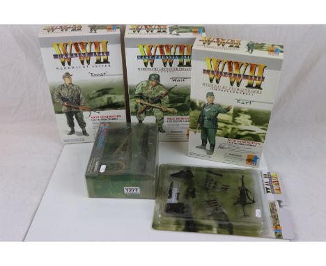 Three boxed Dragon WWII figures to include 70003 Leningrad 1941 Karl, 70009 East Prussia 1945 Karl, and 70016 Ukraine 1944 Er