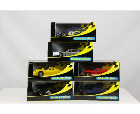 Six cased Scalextric slot cars to include C2363 TVR Speed 12 Collectors Club 2001, C2463 Ford GT MKII 1966 Le Mans No2, C2449