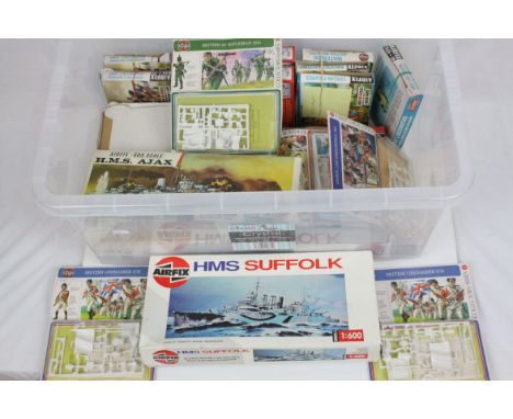 A box of Airfix and Timpo plastic model kits to include HMS Ark Royal, Washington's Army, Tarzan Figures, Ancient Briton's Fi