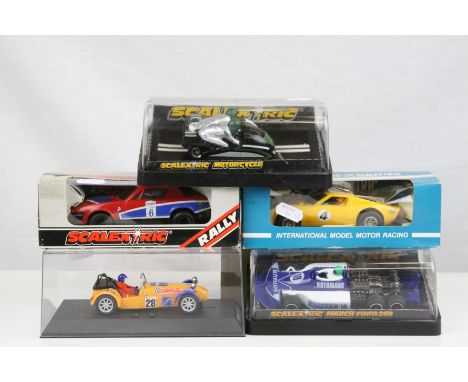 Five boxed / cased Scalextric slot cars to include C282 Green Motorcycle Combination, C130 Rally Triumph TR7, C129 March Ford