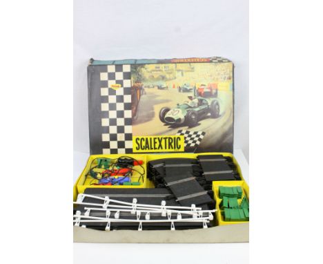 Boxed Triang Scalextric Set 31 with both slot cars, unchecked but appearing gd, tatty box