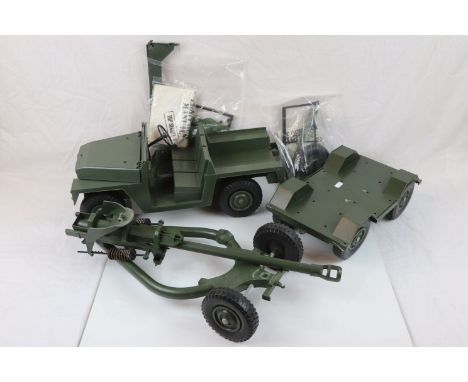 Two original Palitoy Action Man vehicles to include Army Landrover and 105mm Light Gun, with accessories and parts