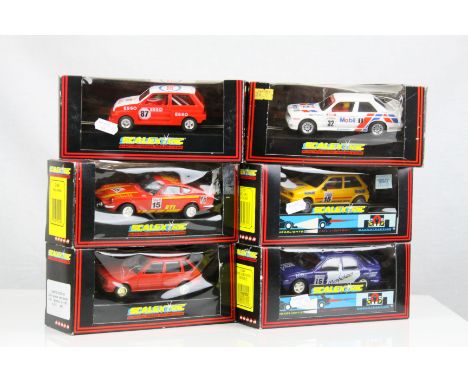 Six boxed Scalextric slot cars to include C459 Shell Datsun, C316 Ford XR2 Valvoline, C424 Ford Cosworth Mondeo, C480 ESSO Me