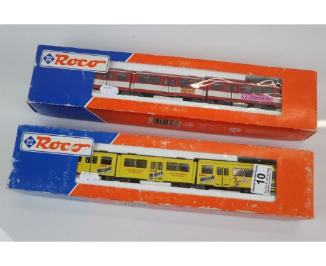 Two boxed Roco HO scale three car set to include Nesquik and Jagermeister livery