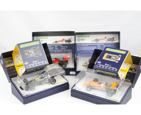 Four boxed Scalextric Legends slot cars to include C3703a Lotus 72, C3545a McLaren M7C, C3542 Lotus Type 72C and C3656a Lotus