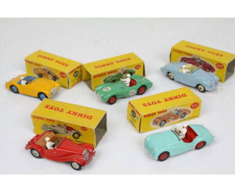 Five boxed Dinky diecast models to include 107 Sunbeam Alpine Sports in pale blue, with driver, cream hubs, 108 MG Midget Spo