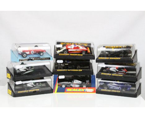 Nine cased Scalextric slot cars to include C126 JPS Lotus 77, C282 Green Motorcycle Combination x 2, C137 Ligier JS11, C025 F