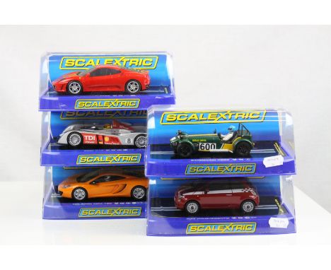 Five cased Scalextric slot cars to include C2822 Ferrari F430 red, C2809 Audi R10 TDI Power no 8, C3200 McLaren MP4-12C, C330