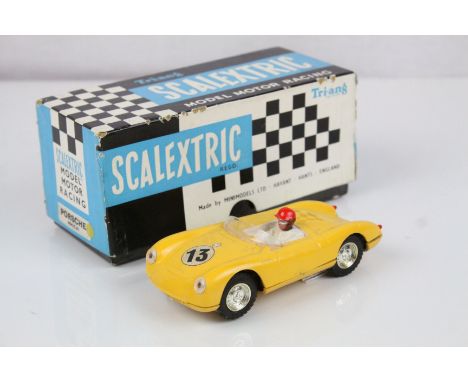 Boxed Triang Scalextric MM C61 Porsche slot car in yellow, driver with red helmet, race number 13, some wear, gd box with cor