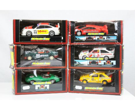 Six boxed Scalextric slot cars to include C251 BMW 318i ESSO Ultron, C456 Ford Cosworth, C2030 Calibra Team Racing, C451 Lamb