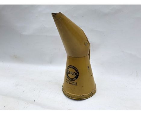 A Redline-Glico Limited Motor Oils and Greases quart oil measure, in good condition.